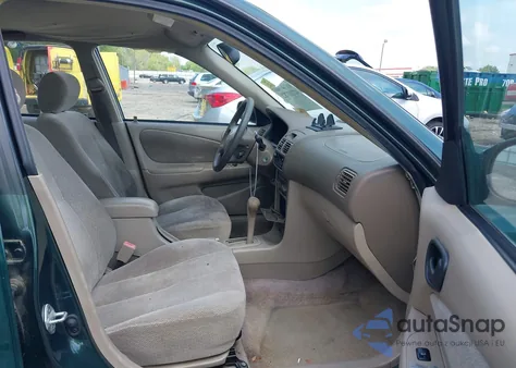 2001 Toyota Corolla Le from USA, damaged, VIN 2T1BR12E41C495405